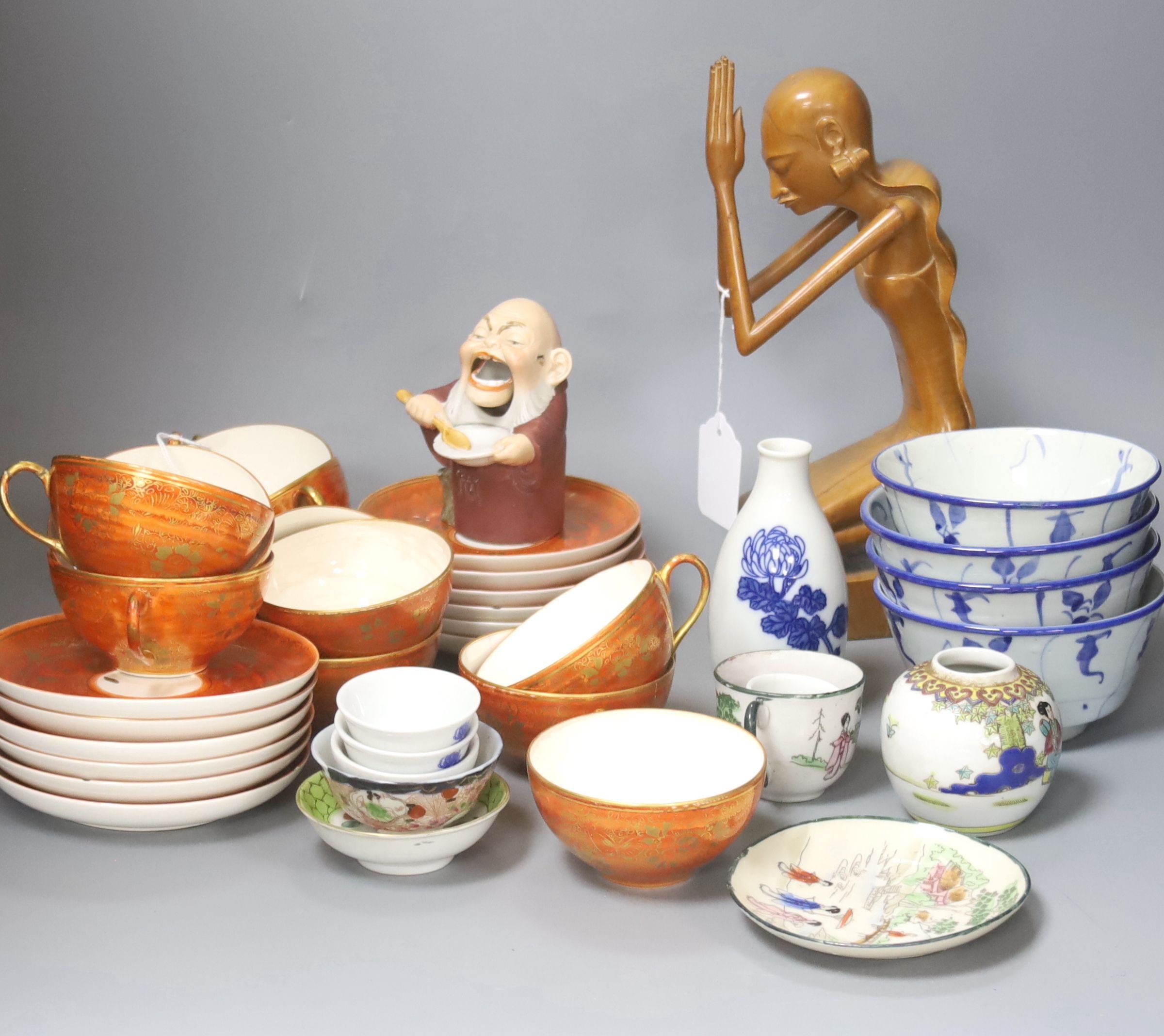 A Japanese orange and gilt eggshell porcelain tea service (24-piece) and sundry items